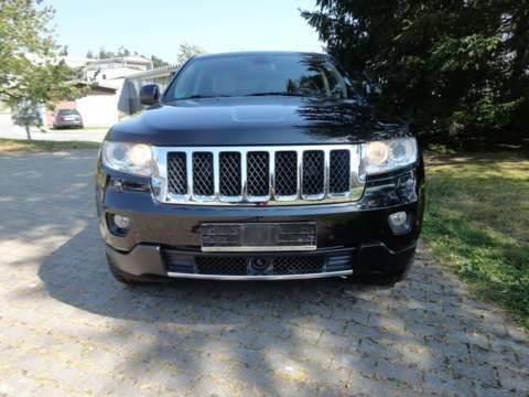 Photo du véhicule JEEP GRAND CHEROKEE 3.6 V6 OVERLAND ATTELAGE SUSPENSION PNEUMATIQUES BVA CAMERA E85 CUIR